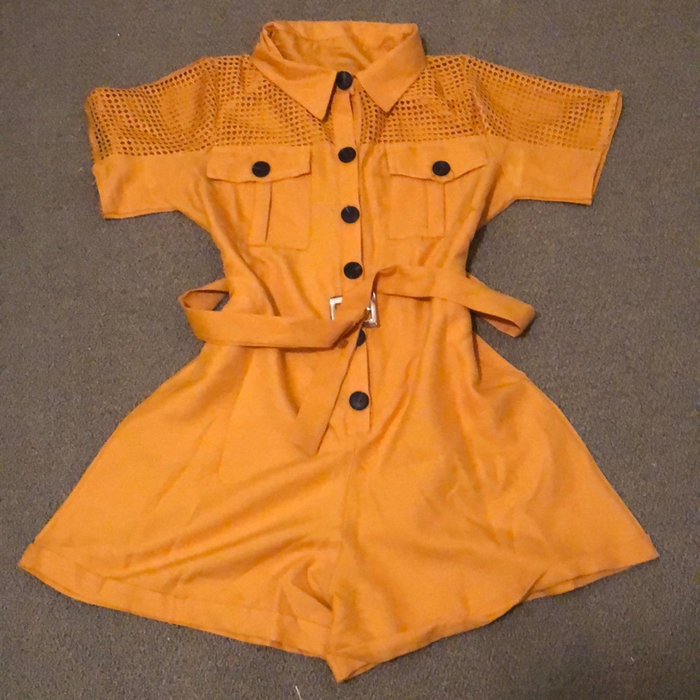 A yellow/gold jumper